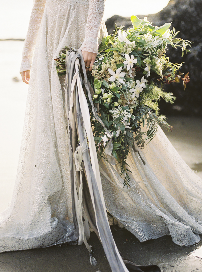 fine art bridal bouquet and wedding dress by claire la faye