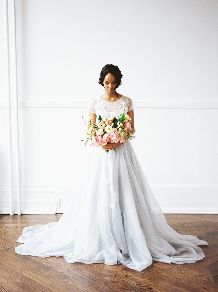portrait of a bride holding her bouquet at her wedding in Toronto