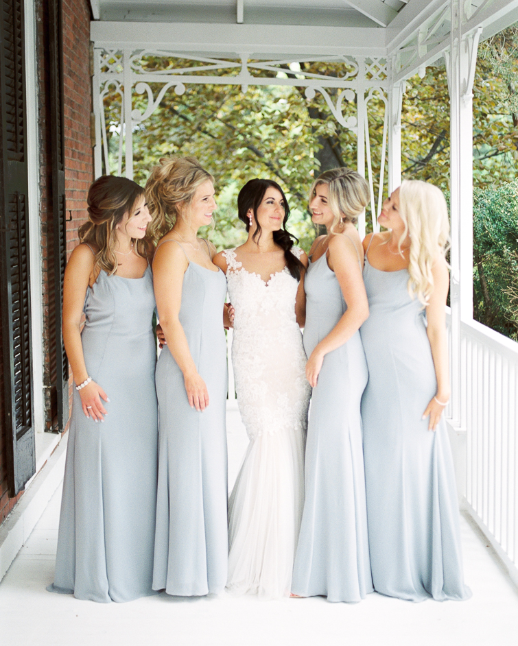bride with her bridesmaids at kurtz orchards