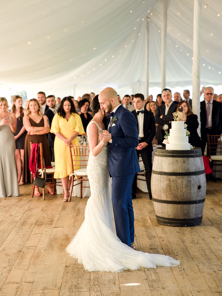 bride and groom have their first dance at kurtz orchards tent reception