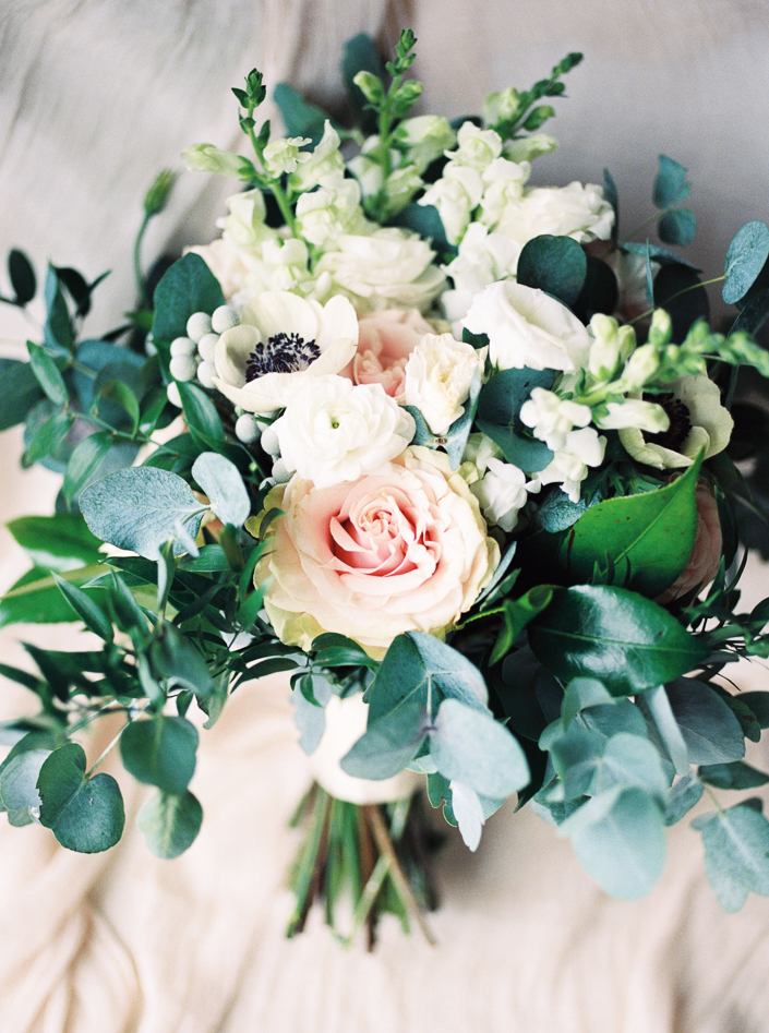 wedding bouquet for a toronto bride with greenery and pastel roses
